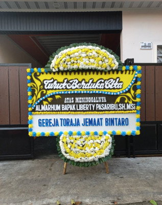 Papan Bunga Duka di Simpang Naneng